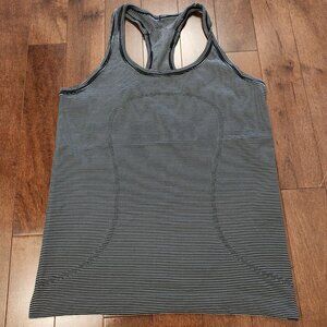 Lululemon women's black and white stripe tank top in size 10